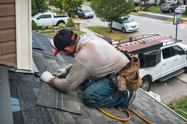Professional Roof Installation technician working in Garden City, NY